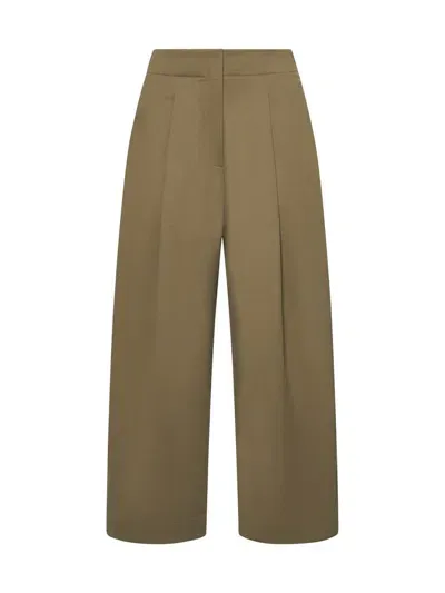 Studio Nicholson Trousers In Tan