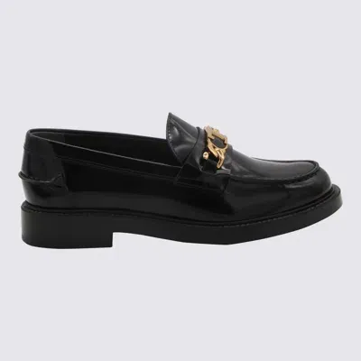 Tod's Black Leather Loafers