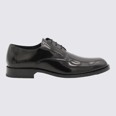 Tod's Black Leather Loafers