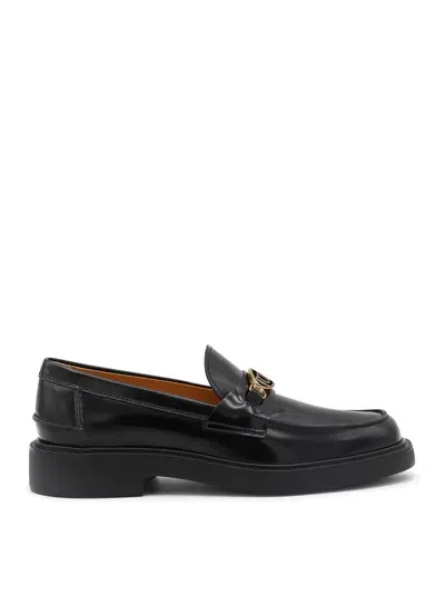 Tod's Black Leather Loafers