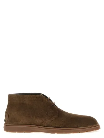 Tod's Round Toe Ankle Boots In Brown