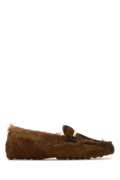 Tod's Gommino Shearling Loafers In Brown