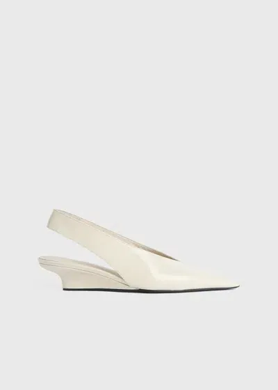 Totême The Wedge-heel Leather Slingback Pumps In Cream