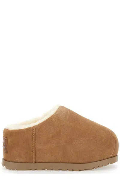 Ugg Pumped Round Toe Slides In Brown