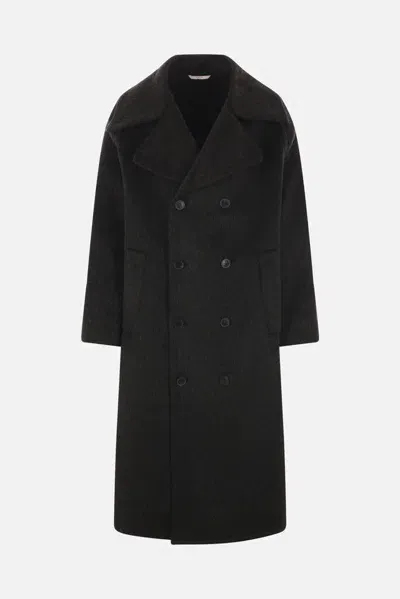 Valentino Garavani Coats In Black