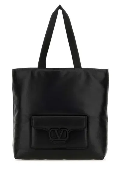 Valentino Garavani Handbags. In Black