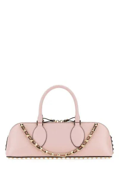 Valentino Garavani Handbags. In Pink