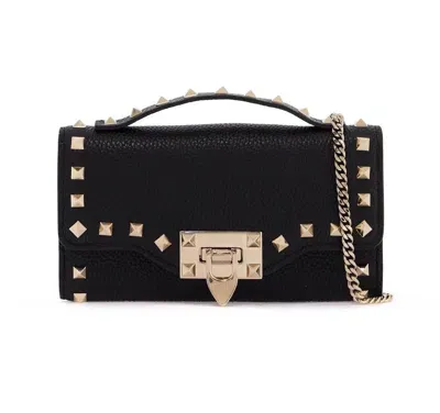 Valentino Garavani Rockstud Foldover Top Clutch Bag In Black