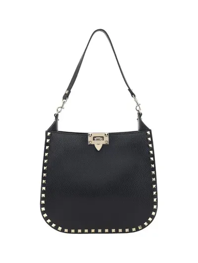 Valentino Garavani Rockstud Logo Printed Shoulder Bag In Black