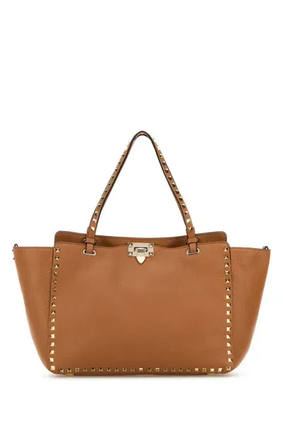 Valentino Garavani Rockstud Pebbled-leather Tote In Brown