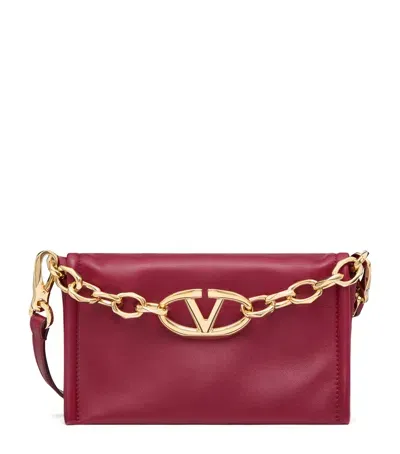 Valentino Garavani Mini Leather Vlogo Chain Clutch Bag In Red