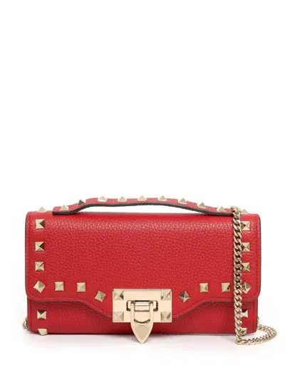 Valentino Garavani Rockstud Clutch Bag In Red