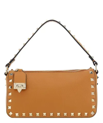 Valentino Garavani Rockstud Handbag In Brown