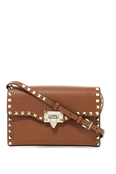 Valentino Garavani Rockstud Small Crossbody Bag In Marrone