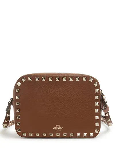 Valentino Garavani Studded Leather Shoulder Bag With Elegant Design And Versatile Strap In Brown