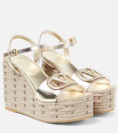 Valentino Garavani Vlogo 110 Cutout Metallic Leather Wedge Sandals In Yh4 Platino