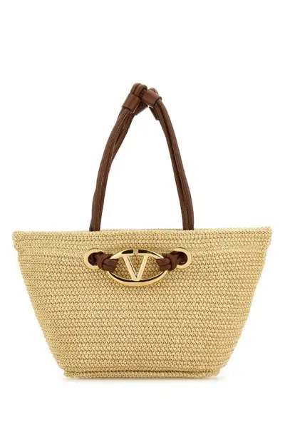 Valentino Garavani Valentino Vlogo Plaque Small Top Handle Bag In Beige