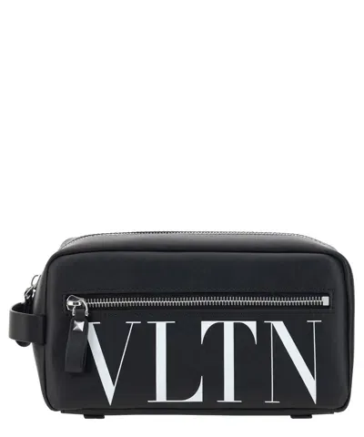 Valentino Garavani Vltn Medium Leather Toiletry Bag In Black,white