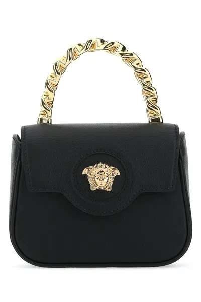 Versace Handbags. In Blackoro