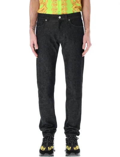 Versace Logo Embellished Straight Leg Jeans In Black