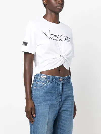 Versace Safety-pin Logo Embroidered Crop T-shirt In 2w020 White-black