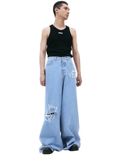 Vetements Logo-distressed Baggy Jeans In Blue