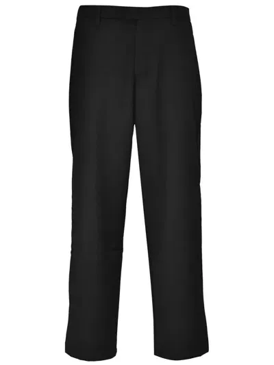 Yan Simmon Trousers In Black