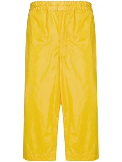 Comme Des Garçons Shirt Side Panel Cropped Trousers In Yellow