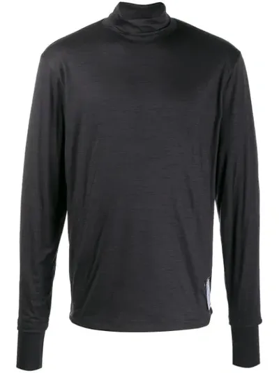 Satisfy Turtle Neck Jumper In Black