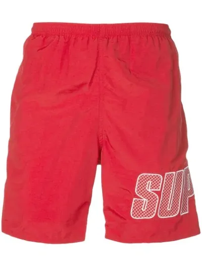 Supreme Logo Print Shorts In Red