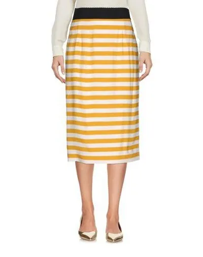 Dolce & Gabbana Midi Skirts In Yellow