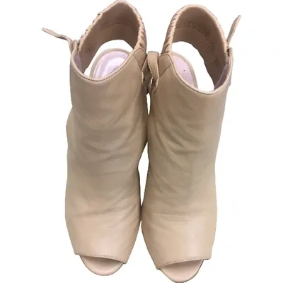 Pre-owned Sergio Rossi Leather Open Toe Boots In Beige