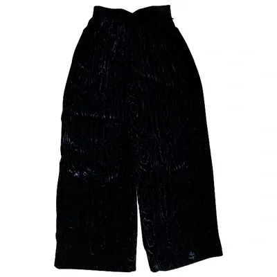 Pre-owned Givenchy Velvet Trousers In Black