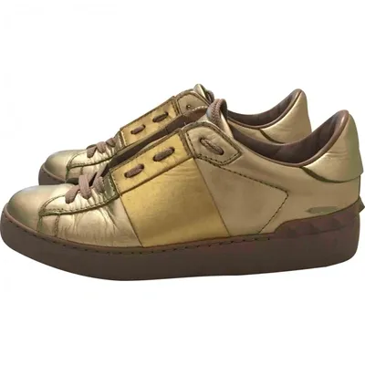 Pre-owned Valentino Garavani Rockstud Patent Leather Trainers In Gold