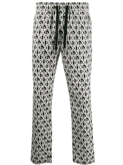 Dolce & Gabbana Repeat Logo Trousers In Black