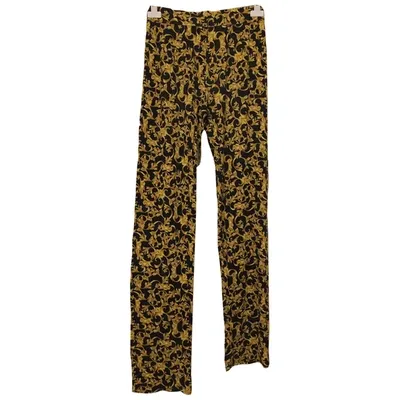 Pre-owned Versace Trousers In Gold