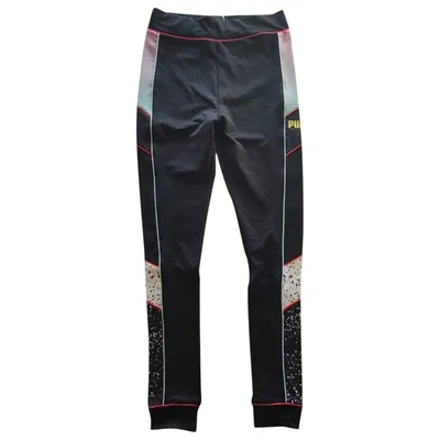 Pre-owned Puma Black Synthetic Trousers