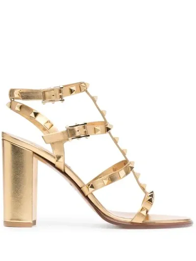 Valentino Garavani Rockstud City Metallic Gladiator Sandals In Gold