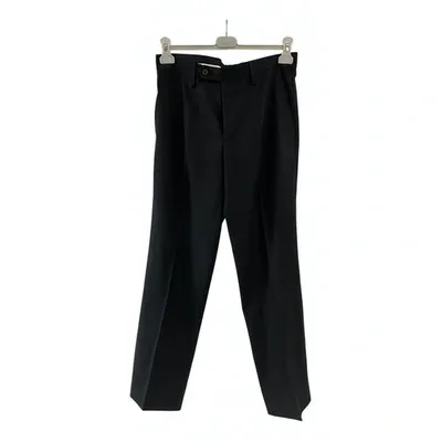 Pre-owned Dolce & Gabbana Wool Trousers In Black