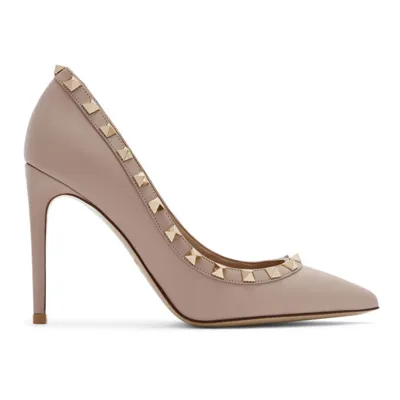 Valentino Garavani Rockstud Patent Leather Pumps In Poudre