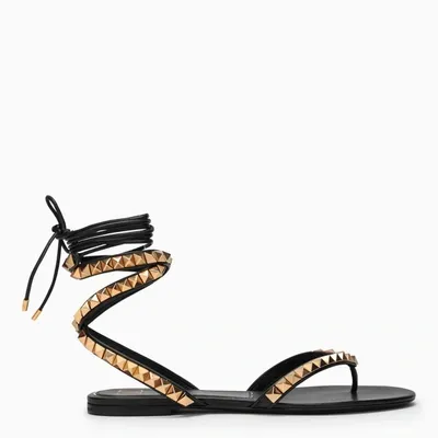 Valentino Garavani Pyramid Studded Ankle Strap Thong Sandals In Black