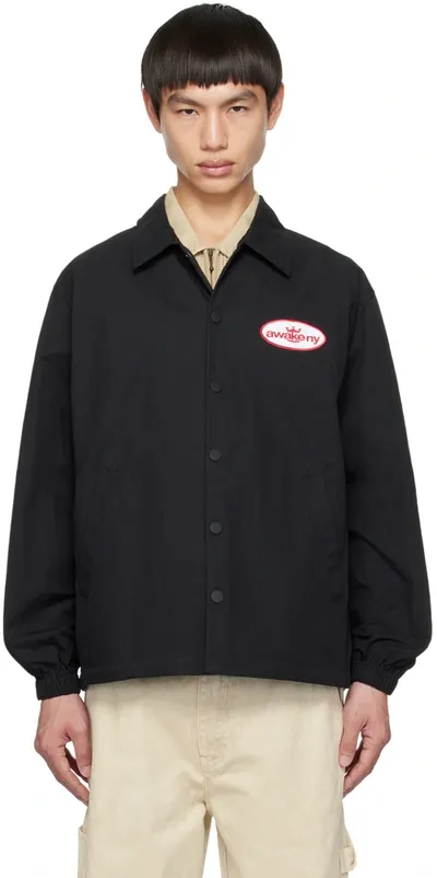 Awake Ny King Logo Twill Coaches Jacket Charcoal In Black