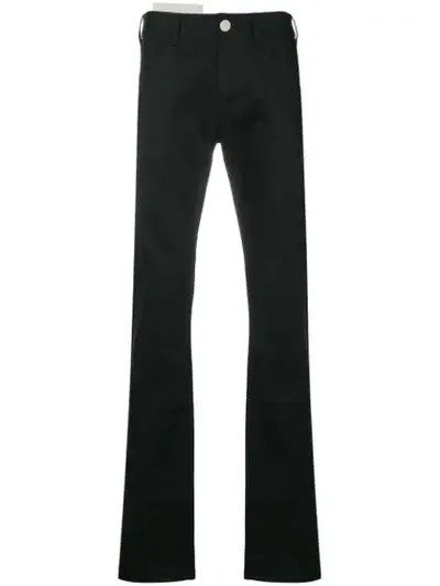 Raf Simons Rear-patch Fitted Jeans In Black