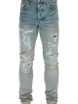 Amiri Staggered-logo Skinny Jeans In Blue