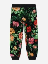 Dolce & Gabbana Chenille Jogging Pants With Rose Print Over A Black Background