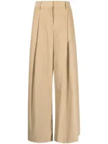 Twp Pressed-crease Cotton Flared Trousers In Braun