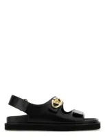 Valentino Garavani 'vlogo Locker' Flat Sandals With Gold-tone Hardware In Black